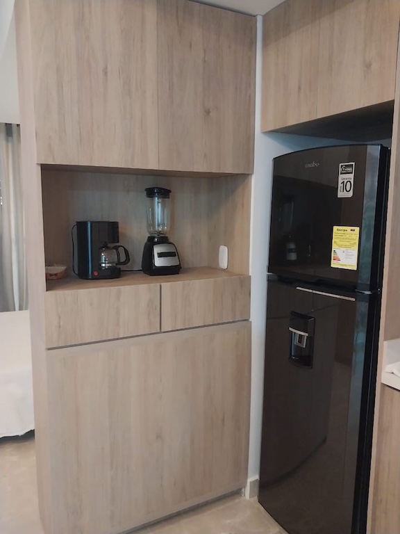 Kitchen inside Cartagena Beach Resort apartment